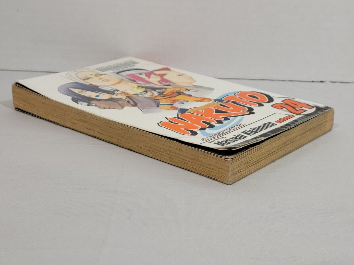 Naruto Vol. 24 by Masashi Kishimoto, Viz Media — pre-owned ex-library manga