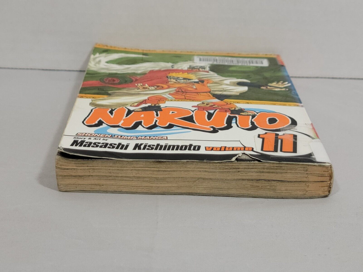 Naruto, Vol. 11 by Masashi Kishimoto Ex-Library copy